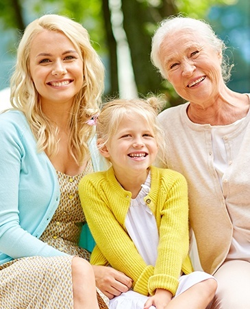 three generations of women smiling