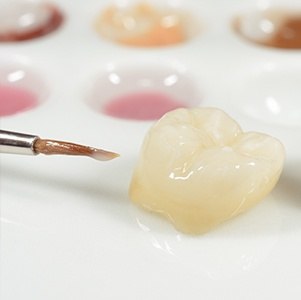 dental crown being painted