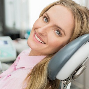 woman in pink smiling