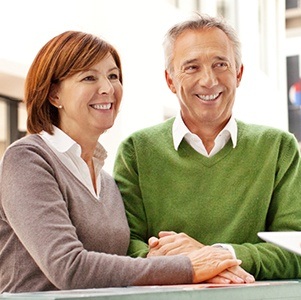 husband and wife in sweaters