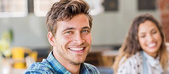 Handsome man with blue eyes smiling