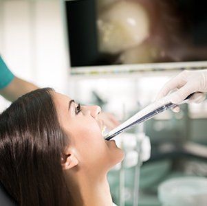 intraoral camera used on woman