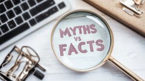 Magnifying glass showing the words “myths vs. facts” 