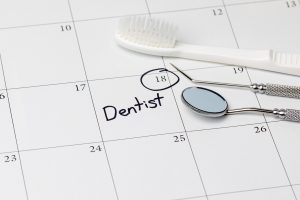 Calendar showing appointment to maximize dental insurance benefits