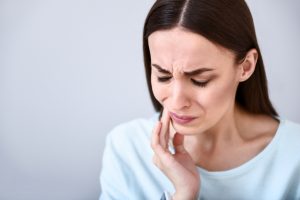 woman with dental pain