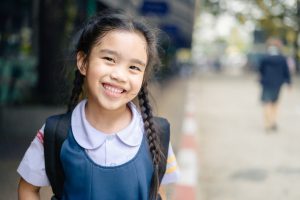 smiling elementary school girl